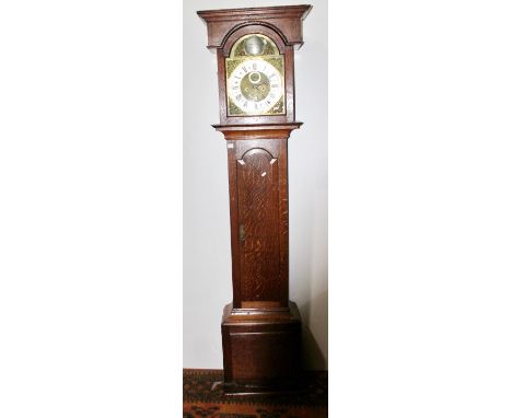 George III chequer-strung oak longcase clock, maker T. Travis of Thame, with 12in arched brass dial with silvered chapter, 21