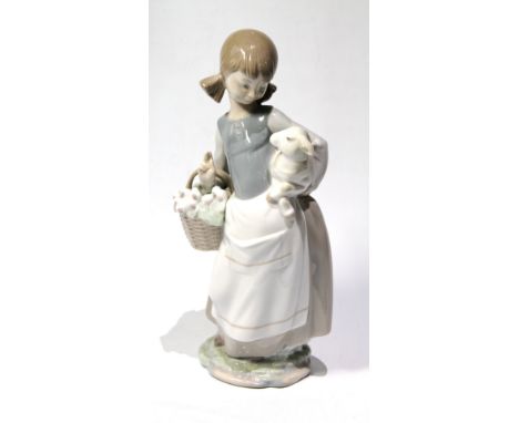 Lladro figure of a girl with a lamb, 25cm.