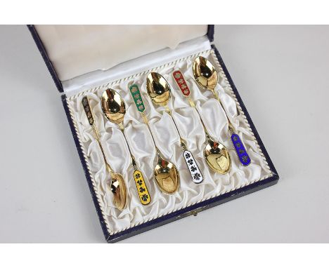 A cased set of six Danish silver gilt and harlequin enamel coffee spoons, maker Egon Lauridsen, Copenhagen (1936-1966)