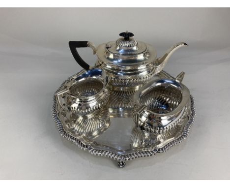 A Mappin &amp; Webb silver plated salver, with gadroon border, monogrammed, together with a half reeded three piece teaset