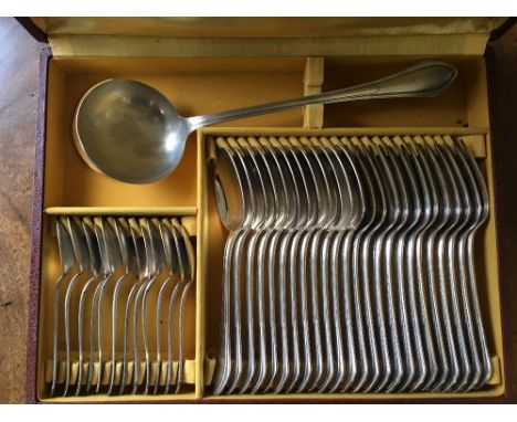 A canteen of French silver plated flatware, including a soup ladle, twelve tablespoons, twelve table forks and twelve teaspoo