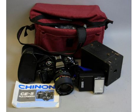 A CHINON CE-5 FILM SLR CAMERA, fitted with a 35-80mm 1:3.5 Macro Zoom lens, an Auto S-520 Flash and a No.120 box Brownie, all