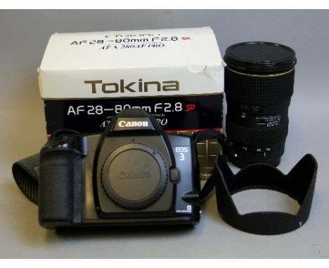 A CANON EOS 3 FILM SLR CAMERA, and a boxed Tokina AT-X Pro Aspherical AF 28-80mm 1:2.8 lens with hood