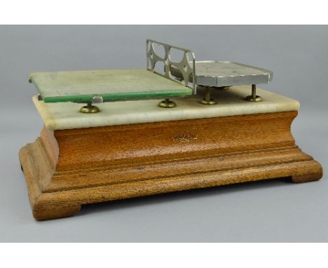 A SET OF BERRY & WARMINGTON OF LIVERPOOL WEIGHWELL SCALES, scales stand on marble topped wooden base, approximate length 58cm