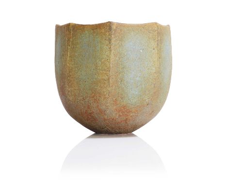 ▲ John Ward (1938-2023), a stoneware pot, in mottled matt brown and turquoise green glazes over a textured surface, the round