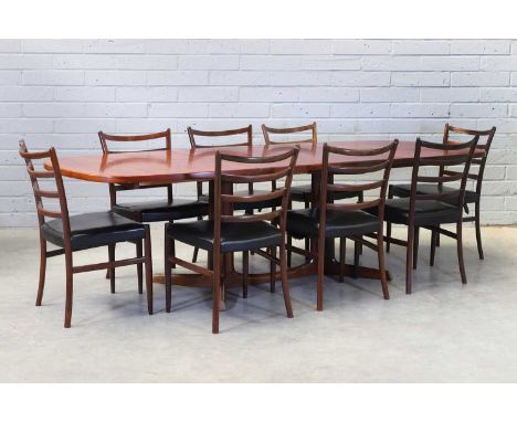 § A Danish rosewood dining suite,  1960s, comprising: a Danish extending rosewood dining table, designed by Niels Otto Møller
