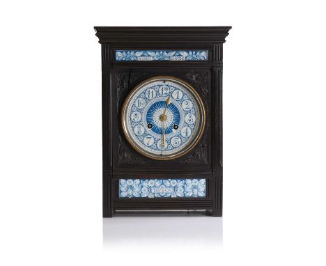 Lewis Foreman Day (1845-1910), an Aesthetic Movement ebonised mantel clock, with a gilt-painted and enamelled pottery dial, w
