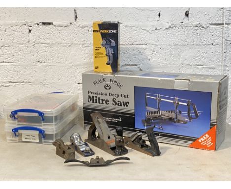 A quantity of tools, to include a a precision deep cut mitre saw, in box, four wood planes and a spoke shave, a Bosch glue gu
