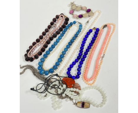 A silver blue john mounted pendant with trace link chain, dyed lapis bead necklace, five various cultured pearl necklaces, a 
