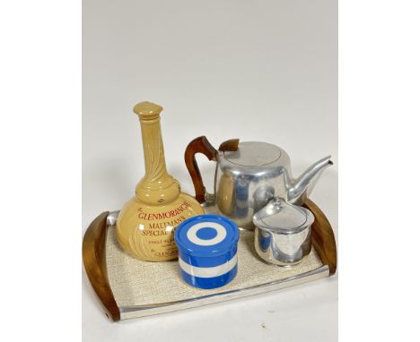 A Piquotware three piece teaset including teak handled rectangular tray with original formica top, tea pot, and sugar basin (
