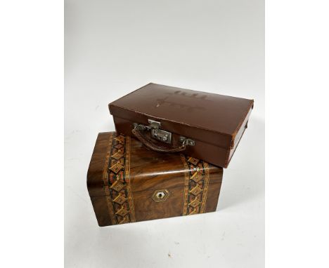 A Victorian walnut inlaid work box with mother of pearl mounted top and inset panel to top, of curved form, with plain interi