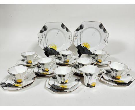 A Melba bone china Art Deco twenty eight piece tea service including two octagonal cake plates, decorated with Rising Sun pat