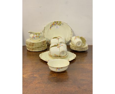 A Paragon china part tea service, comprising two serving plates, milk jug, sugar basin, eleven side plates, eleven cups and s