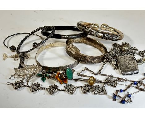 A mixed lot including, a silver enamelled marcasite rose brooch, a silver textured bangle, an Edwardian style silver hollow f