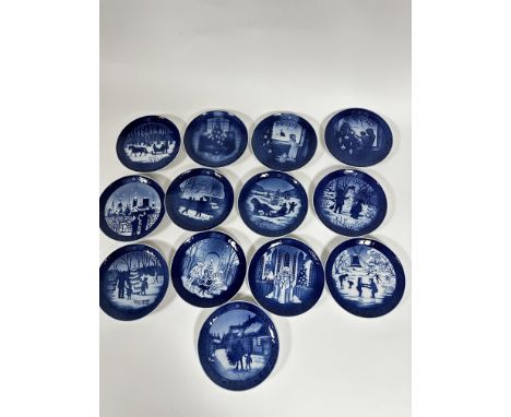 A set of Danish Royal Copenhagen Christmas plates 1979, 80, 81, 82, 83, 84, 85, 86, 87, 88, 89, 90, and 1991, all in as new, 