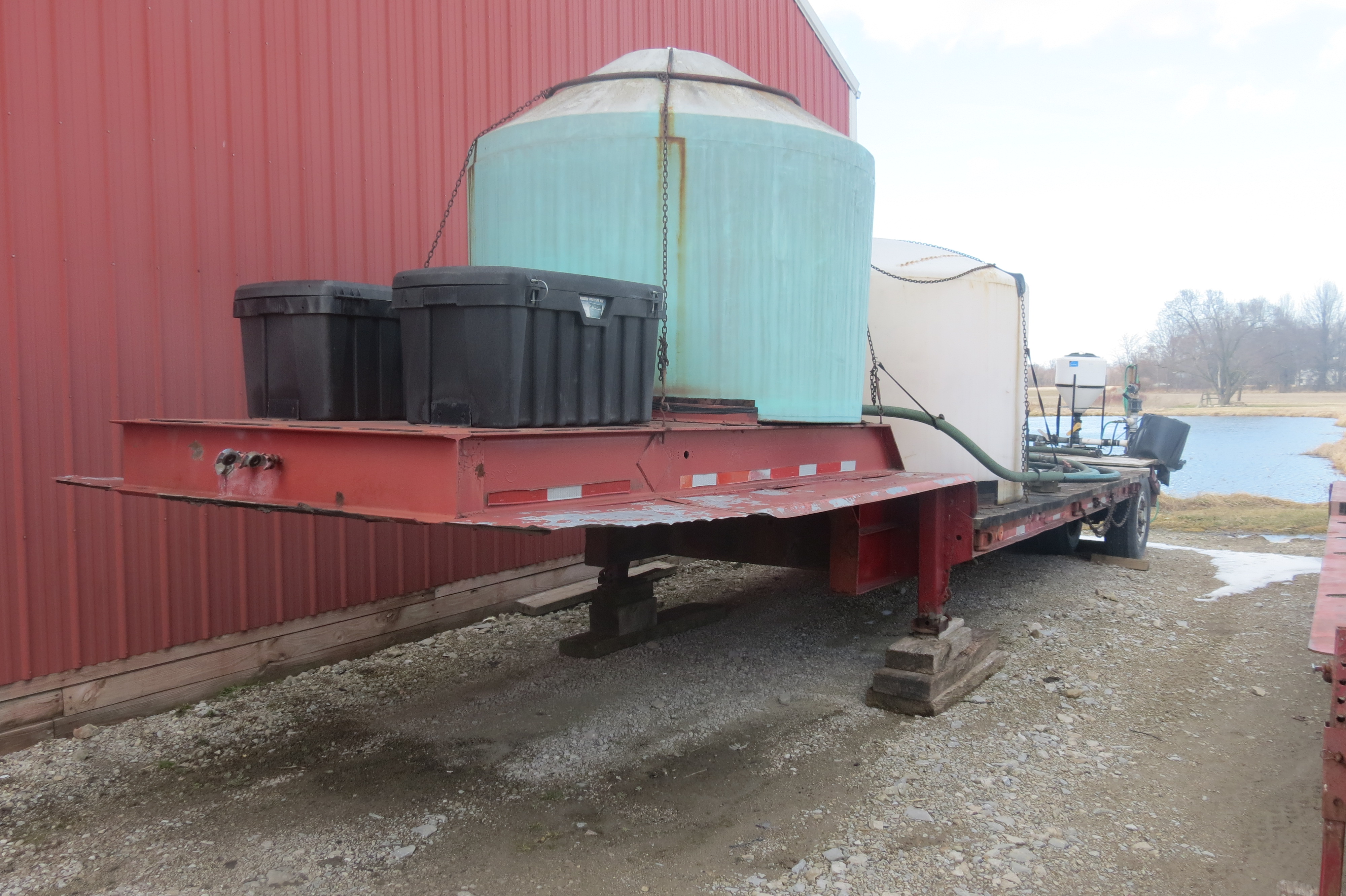 Lowboy trailer with tanks and gas powered pump, no brakes, NO TITLE