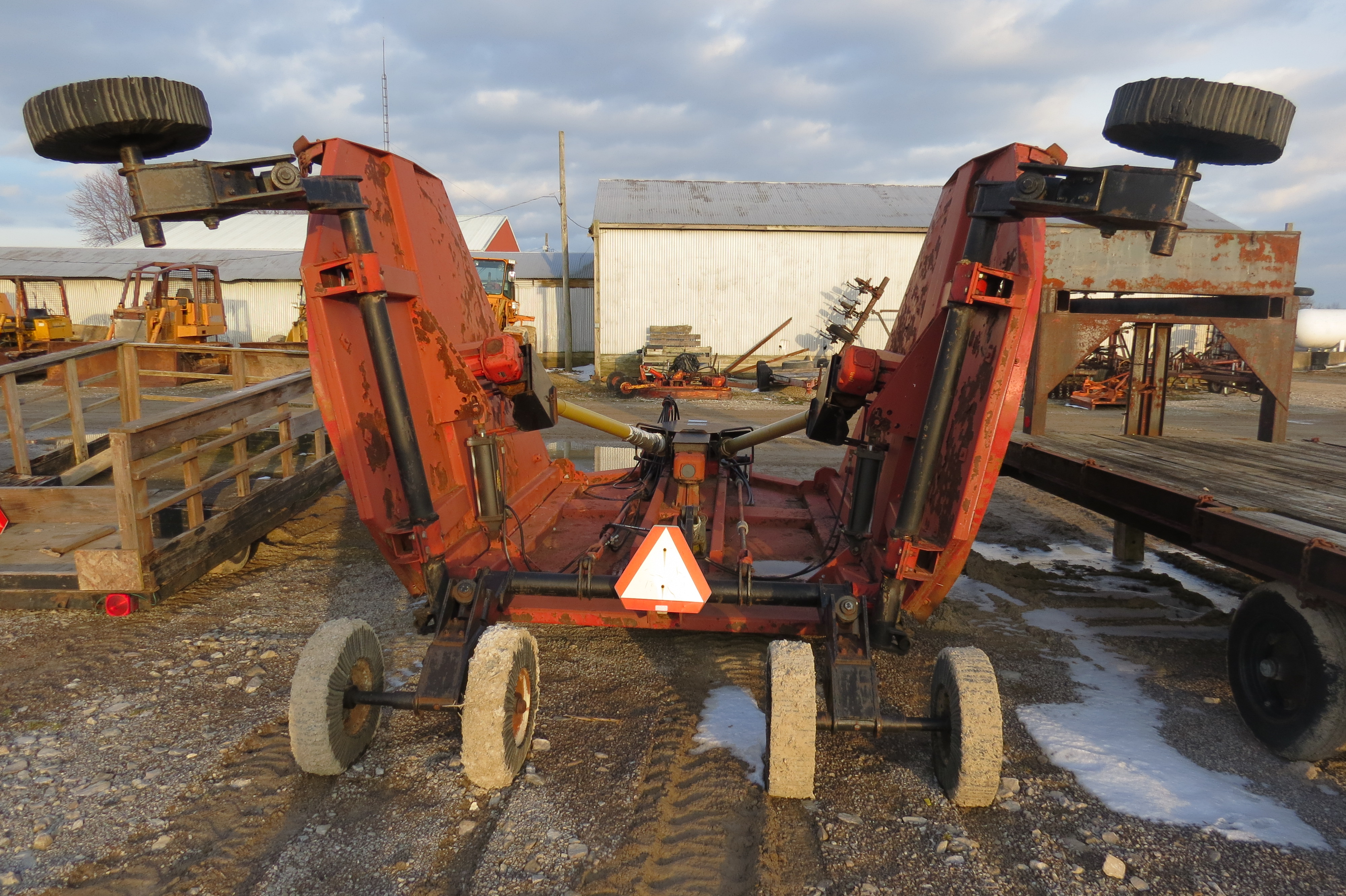 20’ Bush Hog 2620 rotary mower, hyd fold, stump jumper, front chains