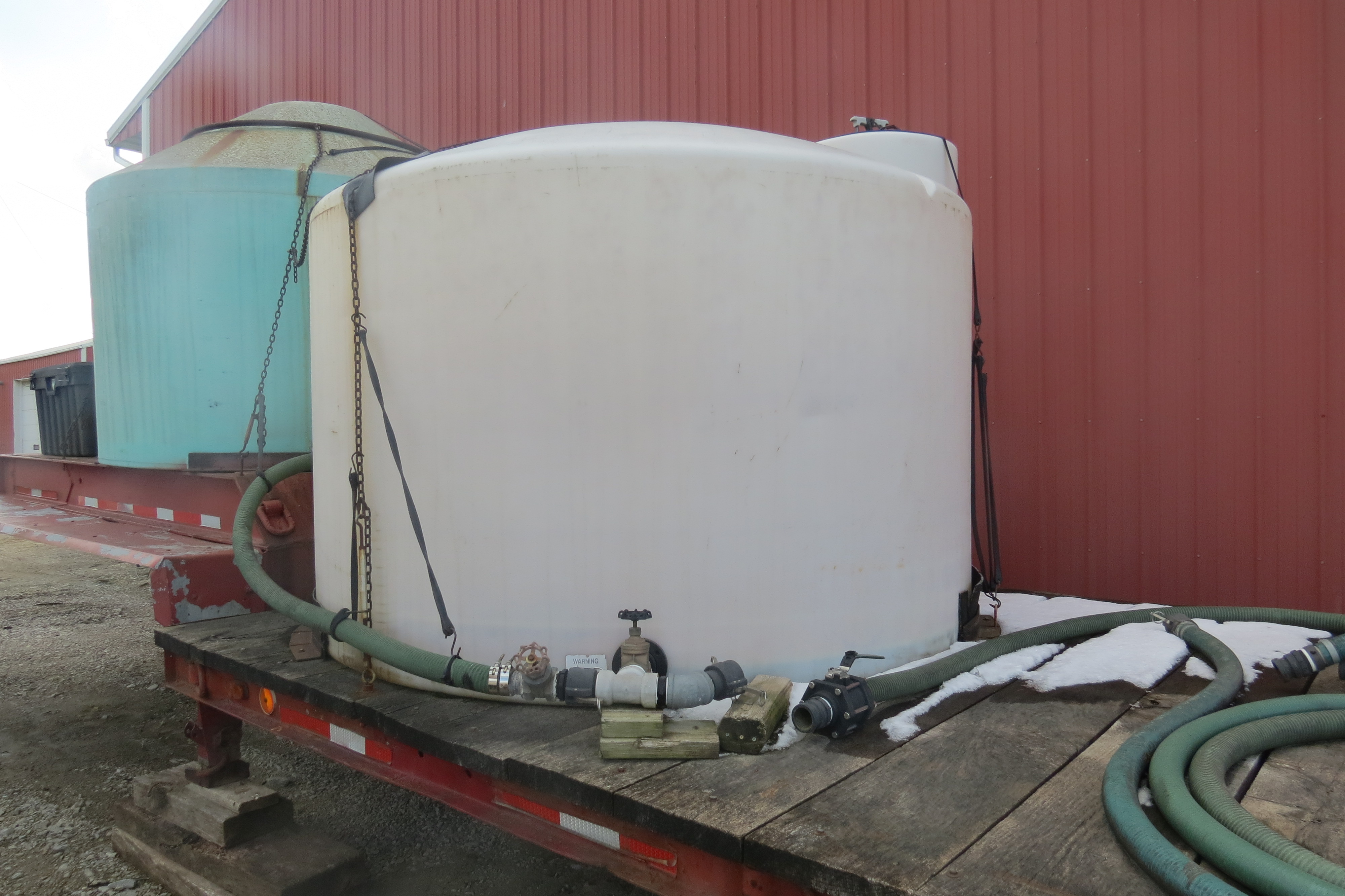 Lowboy trailer with tanks and gas powered pump, no brakes, NO TITLE