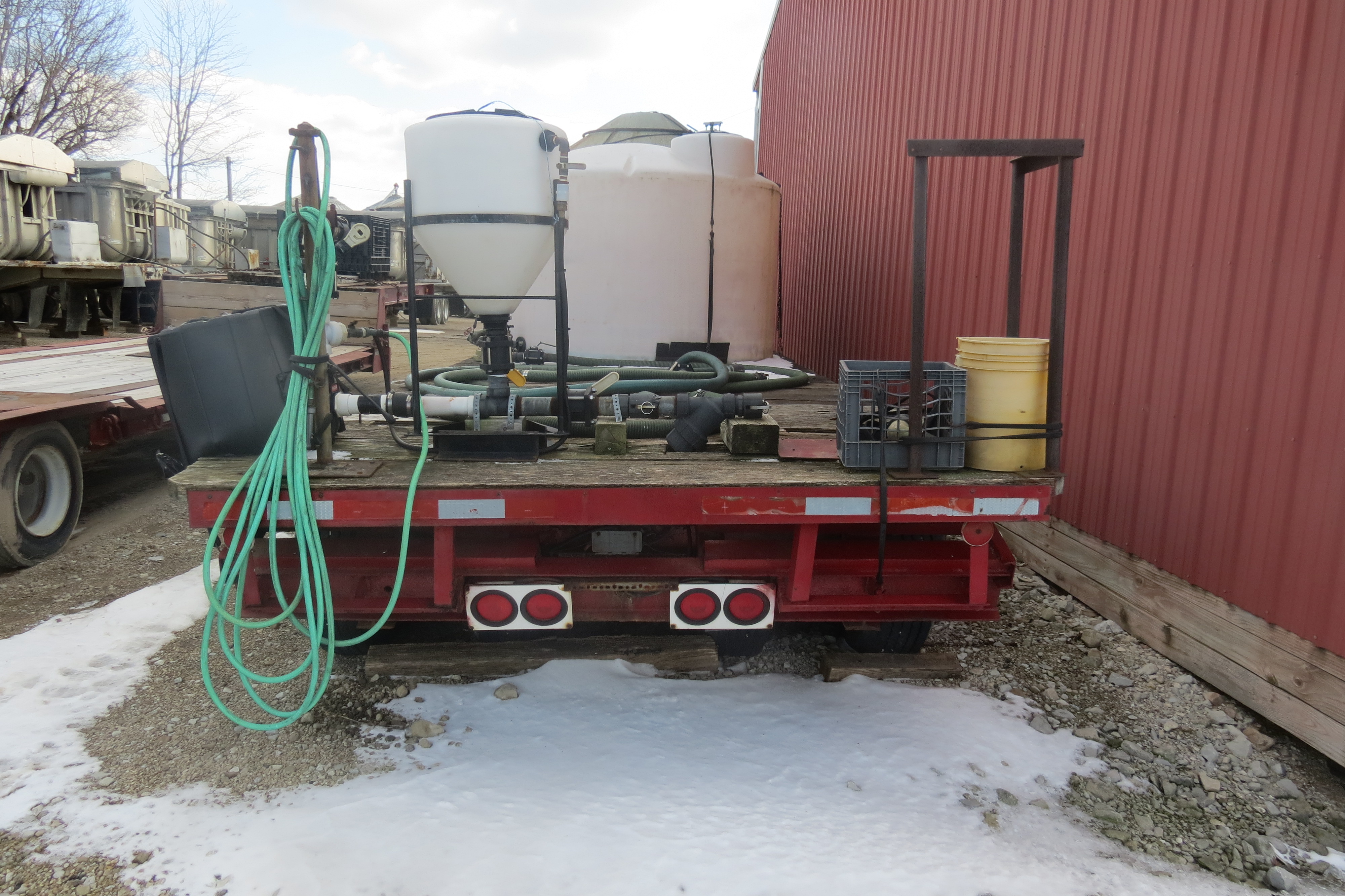 Lowboy trailer with tanks and gas powered pump, no brakes, NO TITLE