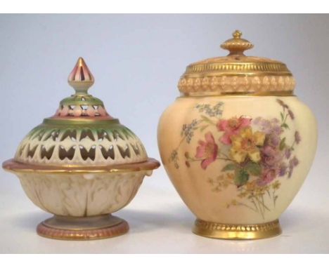 Two Royal Worcester pot-pourri vases, one with pierced cover and body, the second with pierced cover and interior lid decorat