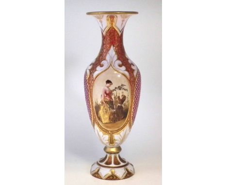 Bohemian overlay glass vase, the white top layer cut through to ruby glass, painted with a lady and child picking flowers, em