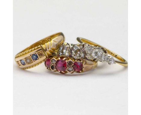 Cushion cut diamond ring with four of five stones, the largest ≈0.5ct; Victorian 22ct gold three-stone ruby ring, intersperse