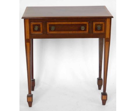 Mahogany side table of three drawers banded in satinwood, width 67cm.