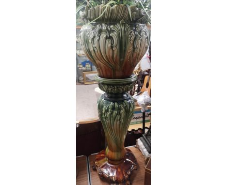 Stunning art nouveau majolica jardineer with pedistal stand in the tinglazed. Stands over 3ft in height. 
