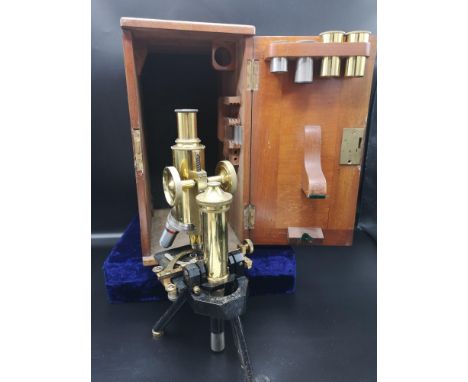 Antique brass J Swift of London microscope in fitted wooden case. 