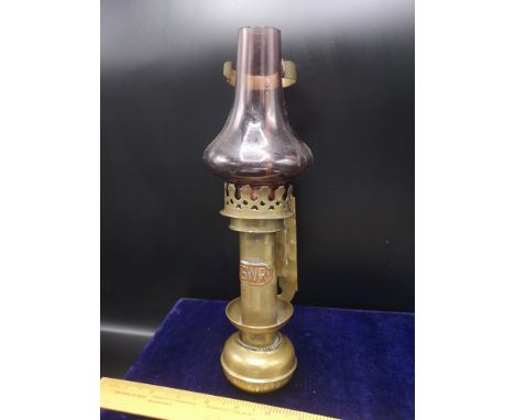 Antique brass railway oil lamp with glass shade. 