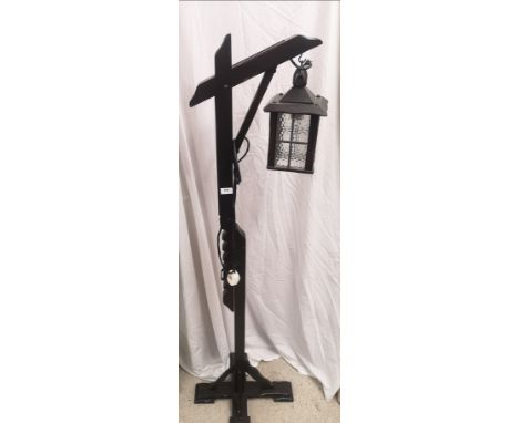 Arts and crafts Oak coach style lattern style floor light. 