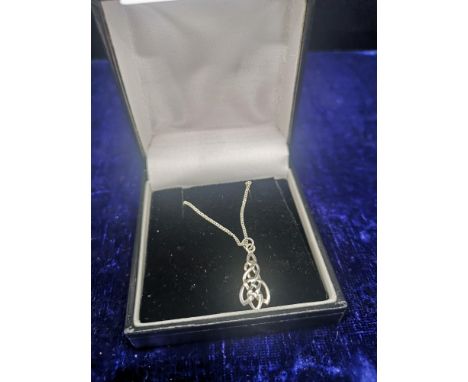 Silver celtic pendant with silver chain. 