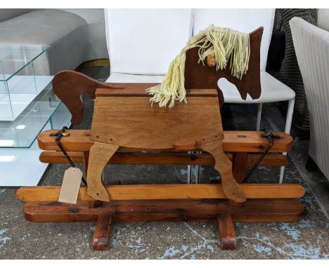 ROCKING HORSE, 120cm x 50cm x 80cm, vintage 1950s pine with wool work mane. 