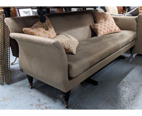 SOFA, 220cm W umber fabric upholstered with scatter cushions, on castors. 