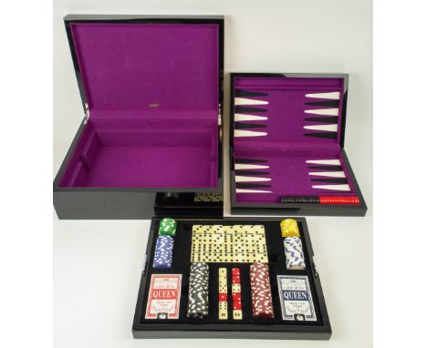 PENHALIGON'S GAMES BOX, black lacquered fitted tray with card sets dice, chips dominos and folding backgammon board in origin