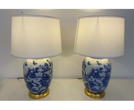 TABLE LAMPS, pair, 52cm H x 35cm diam., Chinese export style blue and white ceramic, Carp detail, neutral shades (2) 