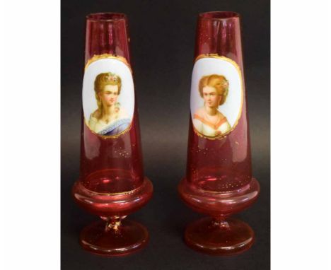 Pair of ruby vases with panels of ladies in Bohemian style, 21cms high 