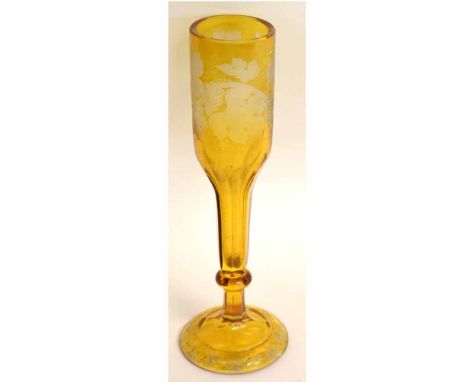 Large Bohemian glass goblet etched with a panel of foliage on an amber ground, 37cms high  