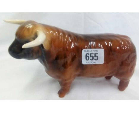 LIGHT BROWN FIGURE OF HORNED BULL