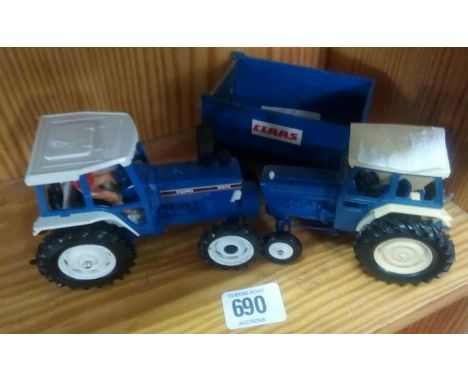 BRITAIN'S 5610 FORD TRACTOR UN-BOXED. BRITAIN'S 6600 FORD TRACTOR UN-BOXED. BRITAIN'S TIPPING TRAILER BLUE UN-BOXED