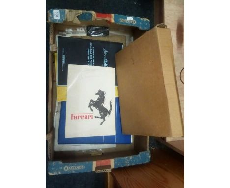 A BOX OF FERRARI MEMORABILIA INCL; WORKSHOP MANUAL