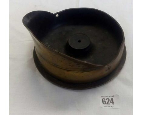 TRENCH ART BRASS IN THE FORM OF A PEAK CAP MADE FROM A BRASS ARTILLERY CARTRIDGE 