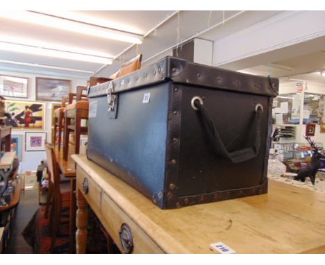 A small black storage trunk