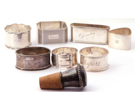 Mixed Lot: 7 various silver napkin rings, to include Victorian buckle example, engraved "Charlotte", London 1873, a George V 