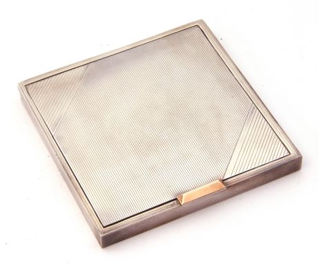 George VI silver compact of square form, engraved with an Art Deco design, fitted mirror to inside of lid, yellow metal clasp