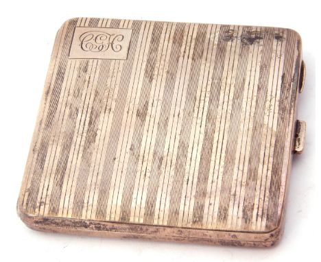 George V silver cigarette case of square form, engraved with alternate bands, having a corner cartouche engraved with a monog