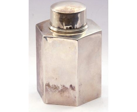 George V silver hexagonal tea caddy of plain polished design, gilt lined with pull off cover, 9 cm high, hall marked for Birm
