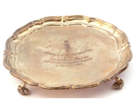 George V small waiter of shaped circular form raised on four snail feet, bearing military presentation inscription dated 1923