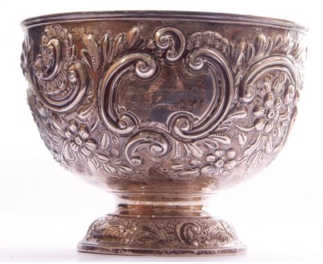 Late Victorian silver pedestal rose bowl embellished with a chased floral and scroll design on a decorative spread pedestal b