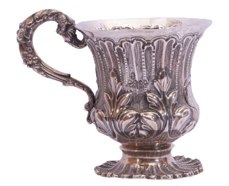 William IV silver christening mug with a deep relief scroll and fluted decoration around the body, shaped handle with a hand 